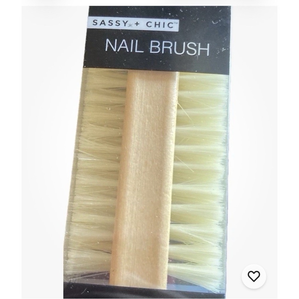 Sassy + Chic wooden nail brush new in package for nail maintenance.